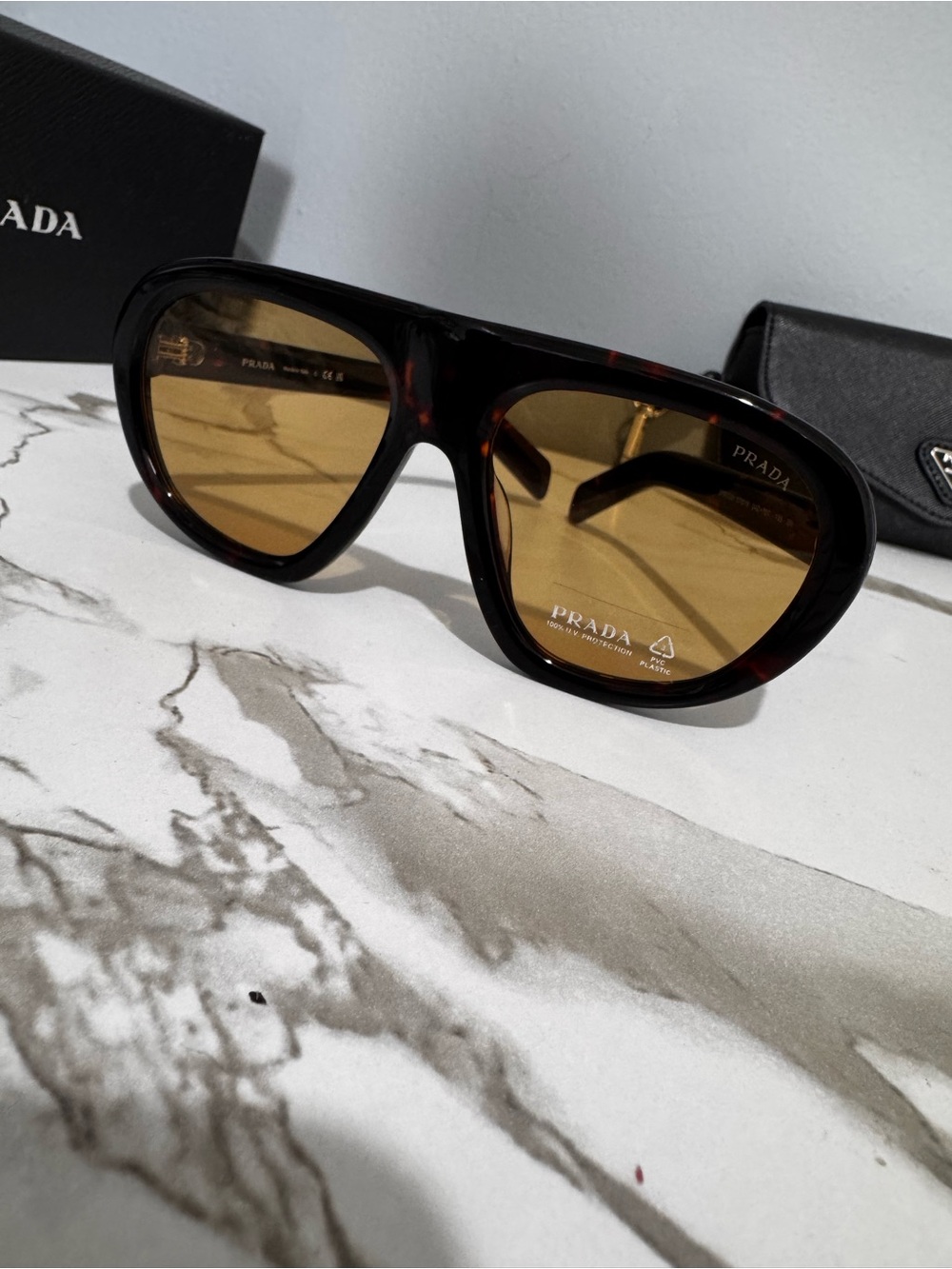 Prada Tortoiseshell Frame Sunglasses with Amber Lenses